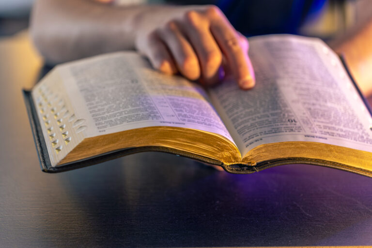 A church member reading an open Bible